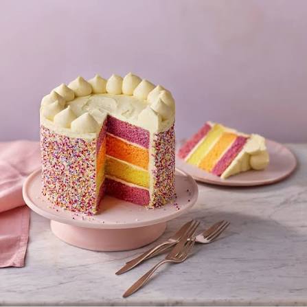 Cakeora baker decorating a custom cake